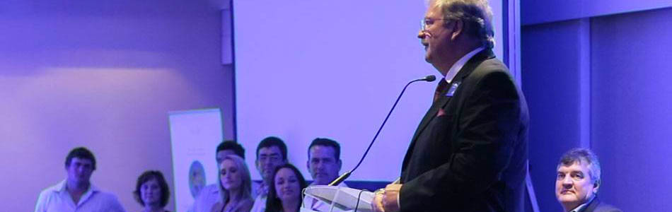Mr Andries Theron congratulates researchers and producers on their achievements